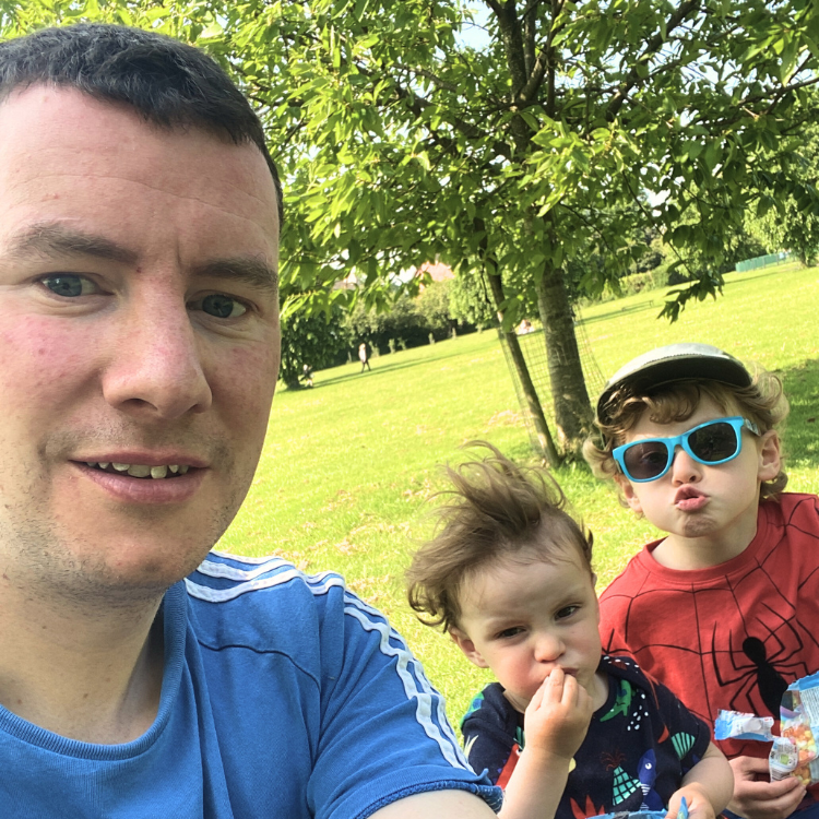 Man in park with chidren