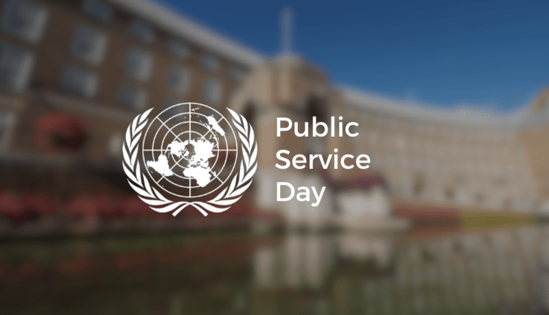 Public Service Day logo in front of local government building