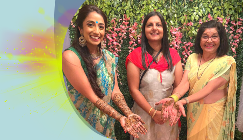 three women celebrating Holi