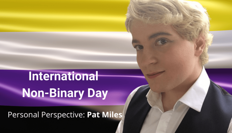 Blonde person smiling at camera on Non Binary day