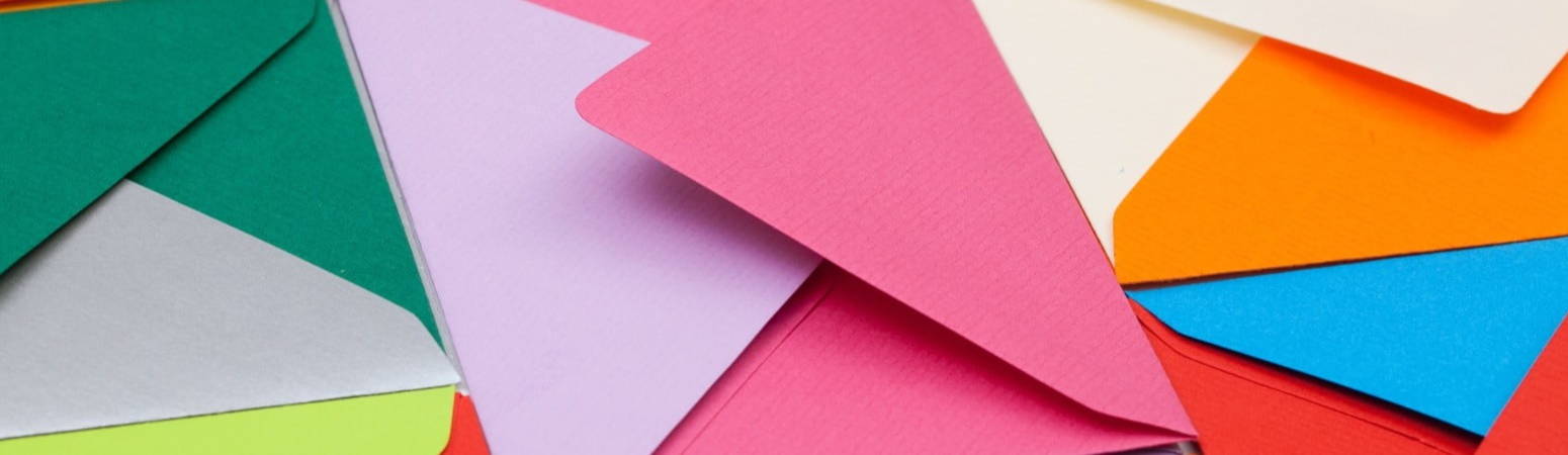 Coloured envelopes in a pile