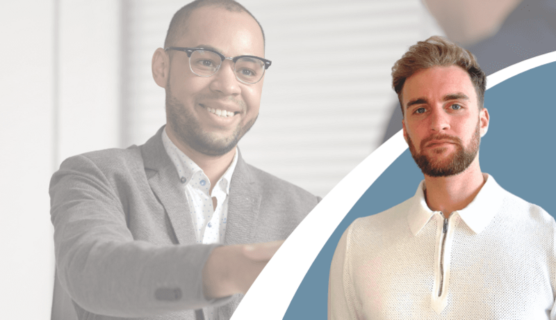 male recruiter with picture in the background of a man shaking another man's hand