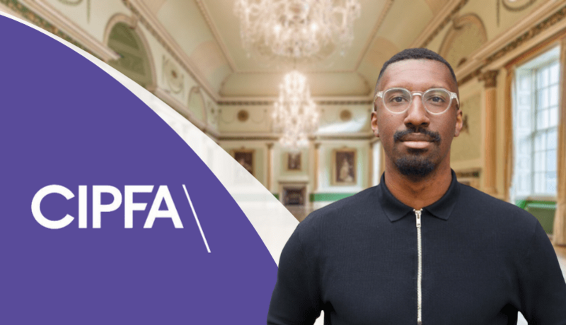 Male recruiter in the Bath Guildhall with the CIPFA logo